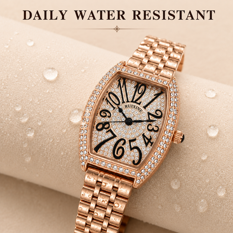 Relógio dourado rosé retangular com pulseira de metal e moldura com strass