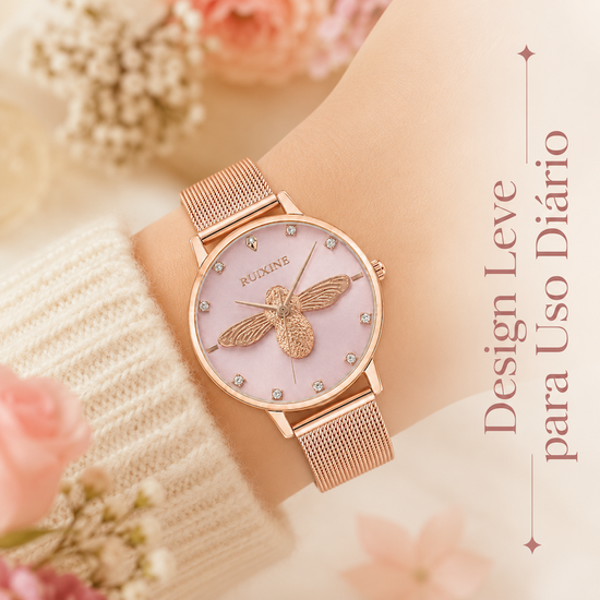 Relógio feminino com mostrador claro e pulseira de aço malha rosé; abelha 3D visível
