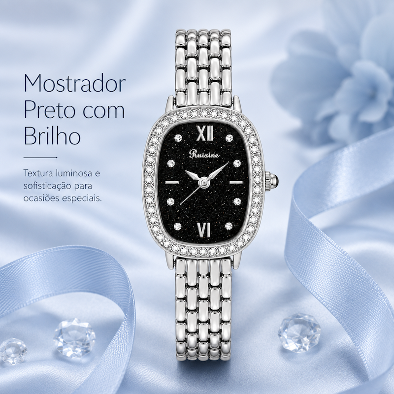 Relógio feminino prateado com mostrador preto, aro de strass e pulseira metálica