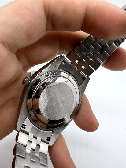 Fundo do relógio Rolex GMT Master II em aço com pulseira metálica e fecho