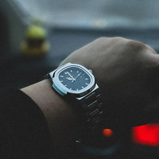 Relógio Nautilus de 41 mm com mostrador azul e pulseira metálica