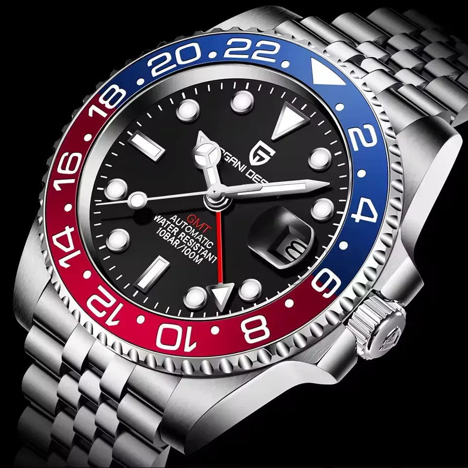 Relógio automático em close: mostrador preto com marcadores e bezel azul e vermelho