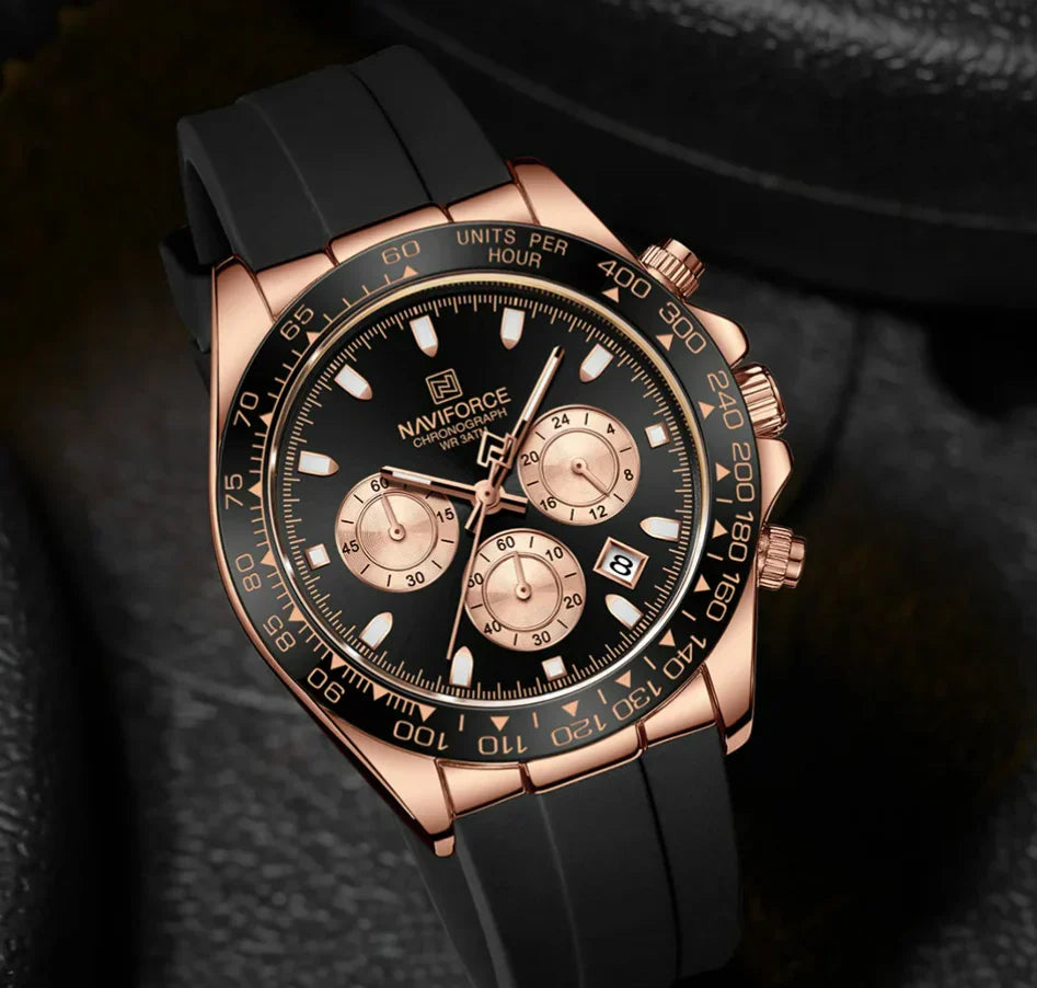 Relógio cronógrafo rosé com mostrador preto, bezel rosé e pulseira de silicone preta