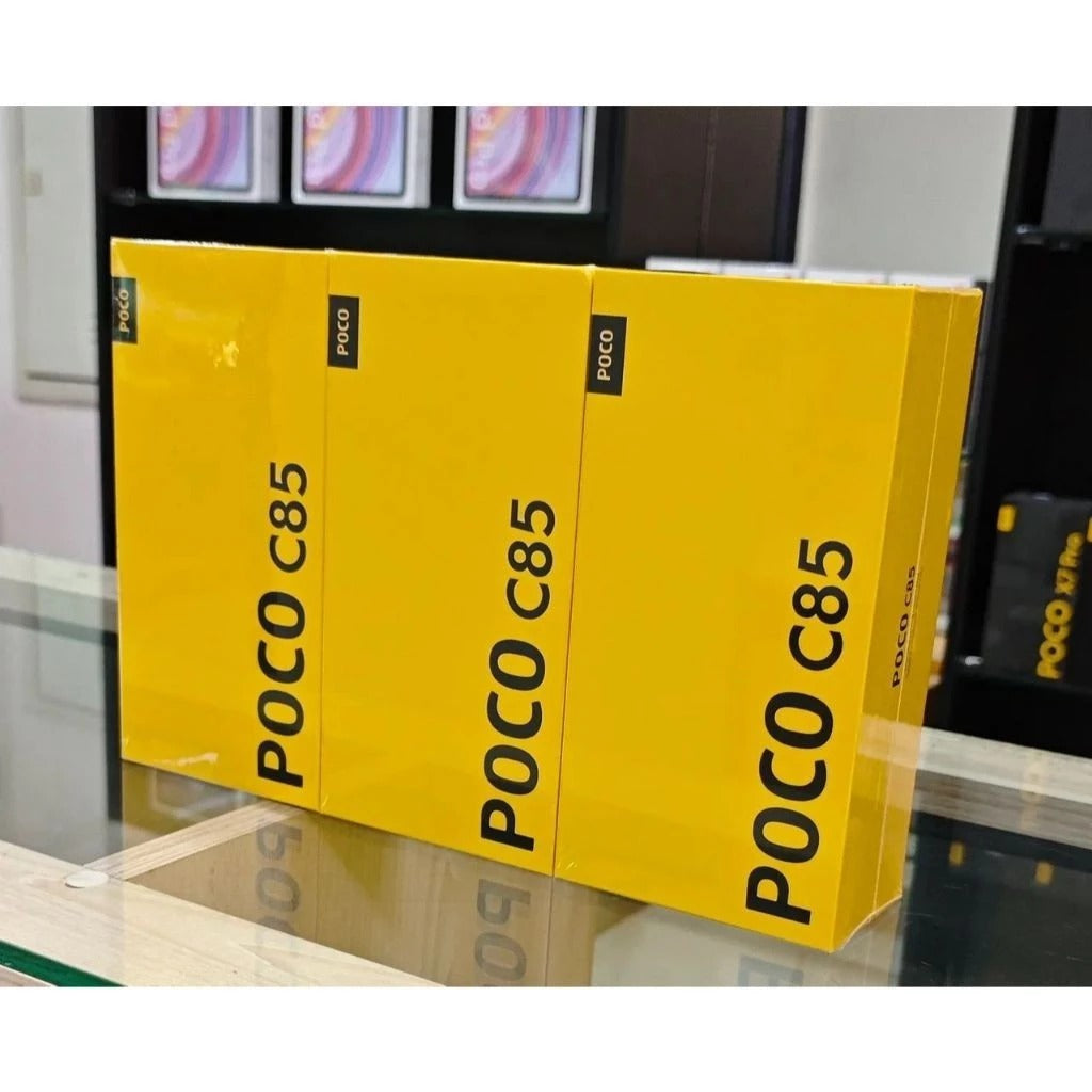 Caixa amarela do smartphone Xiaomi Poco C85 4G, com texto “POCO C85” na embalagem.