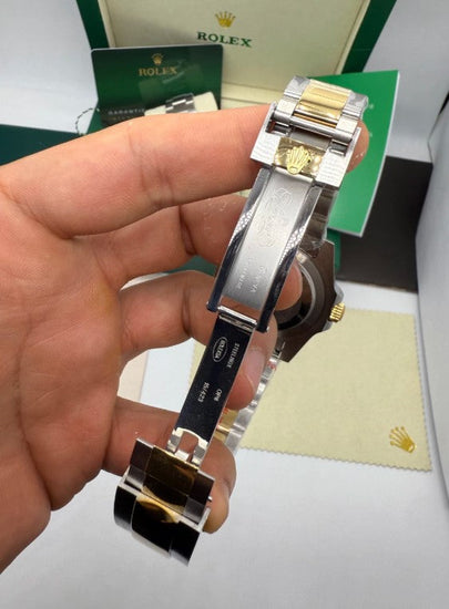 Relógio Rolex Submariner com fecho e pulseira aço e ouro