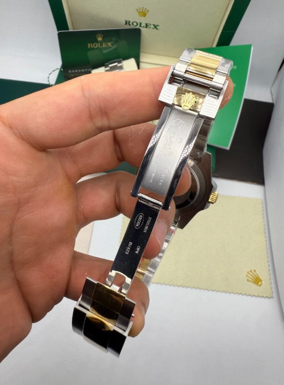 Relógio Rolex Submariner com fecho e pulseira aço e ouro